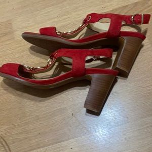 NURTURE red heels with sling back , gold rings